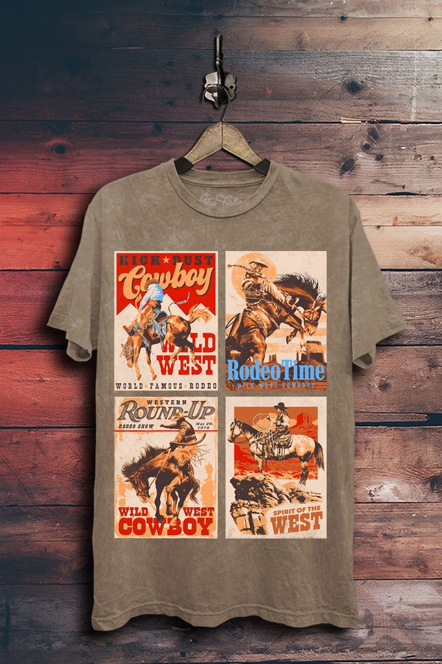 Warm taupe mineral-washed boyfriend tee featuring four vintage-style western posters with cowboys, bronc riders, horses, and rodeo lettering.
