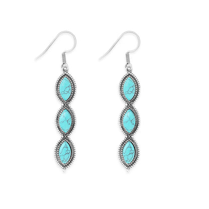 Turquoise stone earrings with silver hooks on a white background
