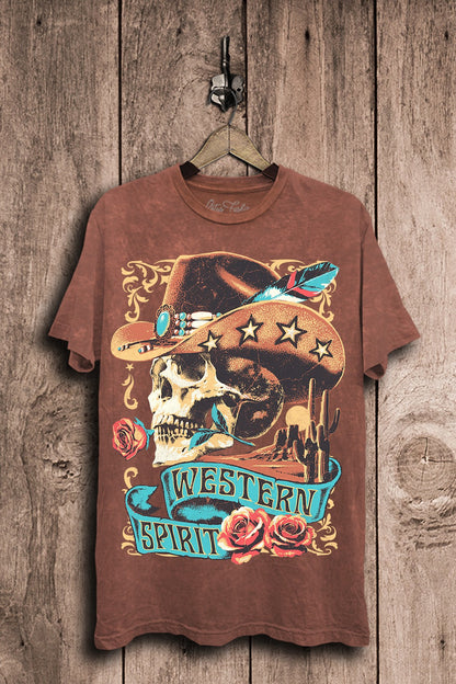 Vintage wine mineral-wash boyfriend tee featuring a cowboy skull in a star-trimmed hat with turquoise accents, roses, feathers, and desert artwork.